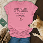 Pink t-shirt with "Sorry I'm late. My dog needed emotional support." text and dog graphic.
