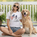 Woman wearing patriotic t-shirt with dog and American flag design.
