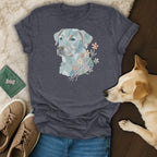 Dark grey t-shirt with a mosaic dog and floral design, paired with jeans and sneakers.