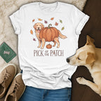 Golden retriever with pumpkin body and "Pick of the Patch" text on a t-shirt.