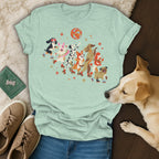 Light green t-shirt with assorted dogs roller skating under a disco ball.