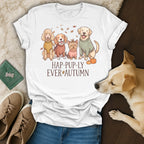 White t-shirt with four dogs in sweaters and text "HAP-PUP-LY EVER AUTUMN".
