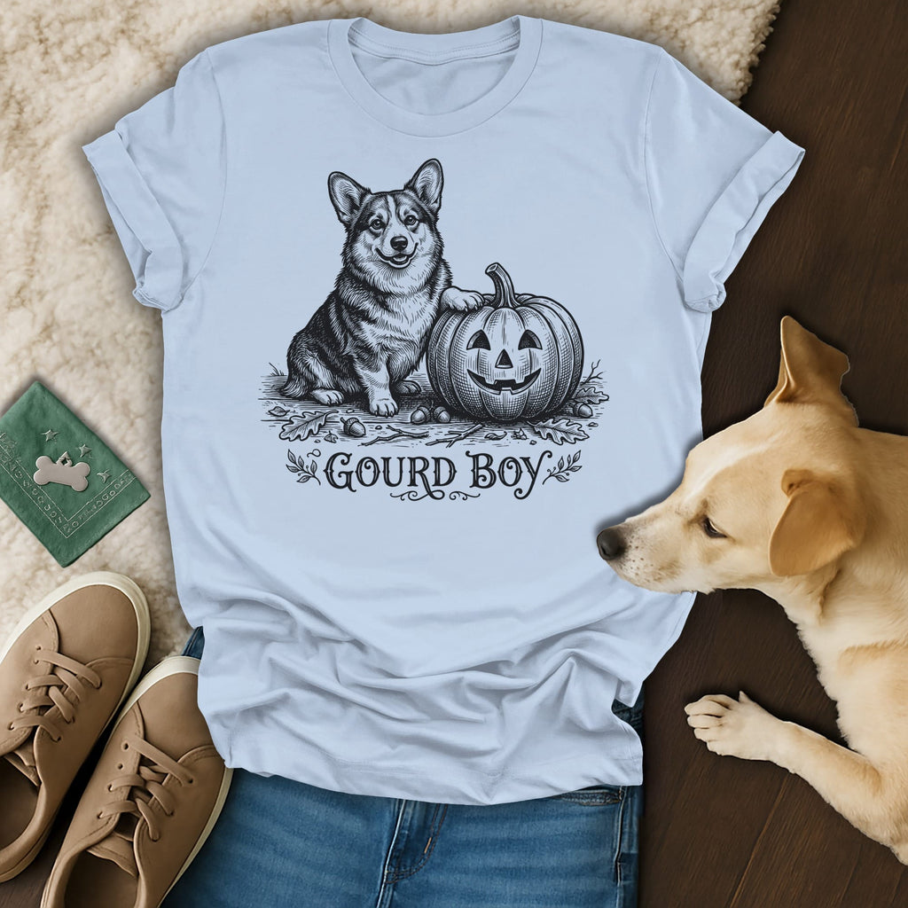 Light blue t-shirt with black ink drawing of a corgi and jack-o'-lantern.