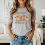 Graphic tee with four cartoon dogs and text "EVERY DAY IS BETTER WITH DOGS".