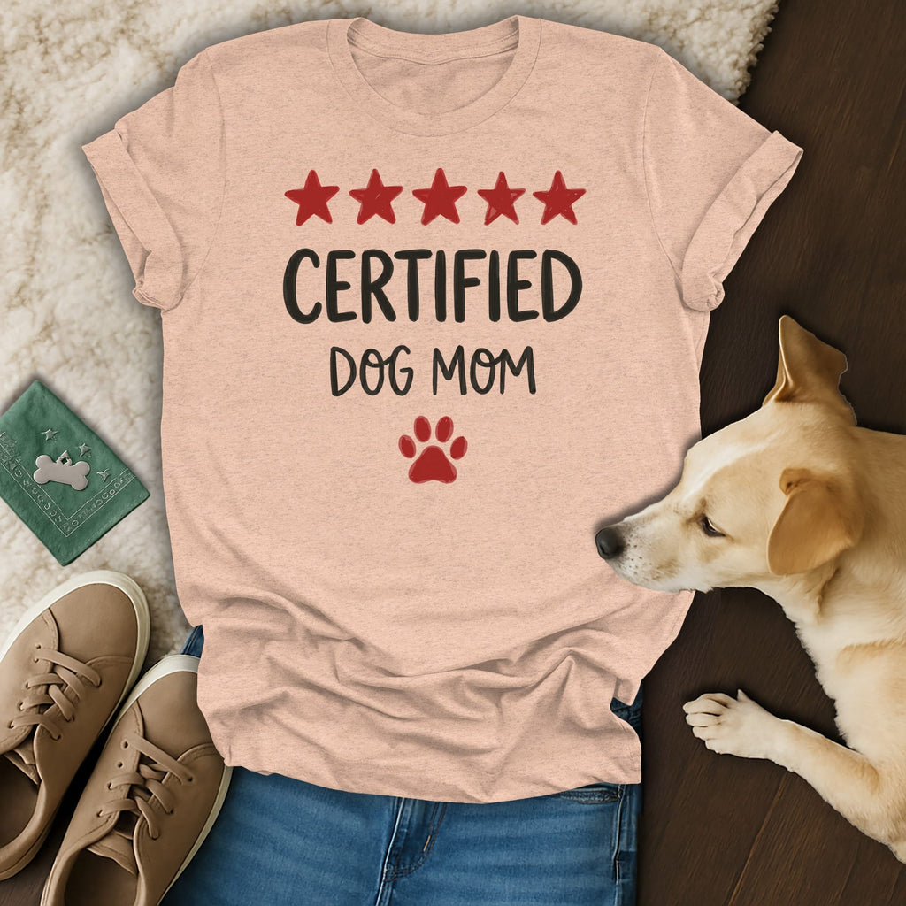 Peach t-shirt with "Certified Dog Mom" text and red dog paw print.