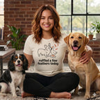 Woman in t-shirt with corgi and duck graphic and text "ruffled a few feathers today" with two dogs.