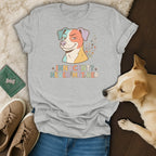 Grey t-shirt with a colorful dog graphic and "Innocent? Never Met Her" text.