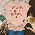 Peach t-shirt with red text reading "JUST A GIRL WHO LOVES HER DOG" and paw print.