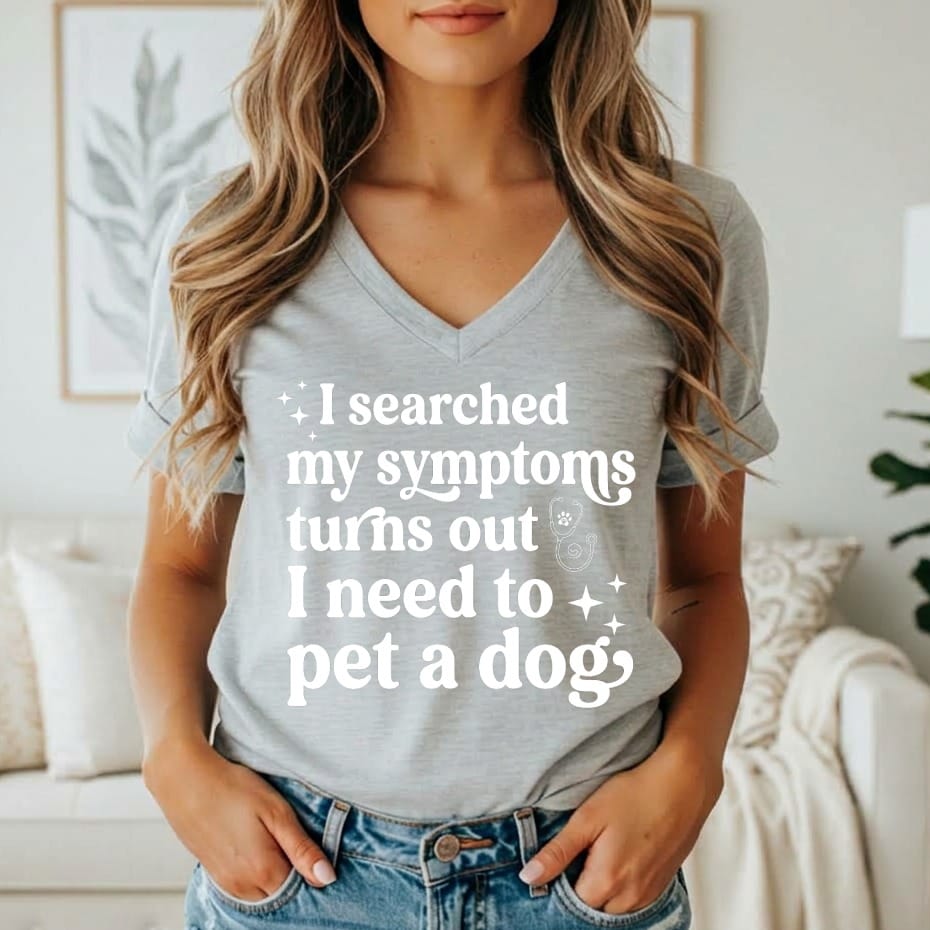 Light gray t-shirt with white text: "I searched my symptoms turns out I need to pet a dog."