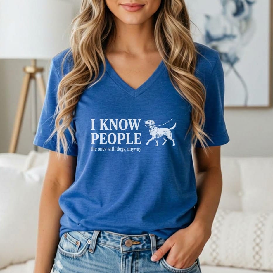 Blue t-shirt with white text and a dog graphic that says "I know people".