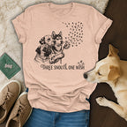 T-shirt with three dogs and "Three snouts, one wish" text.