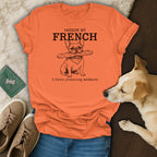 Orange t-shirt with French bulldog holding baguette and text "Pardon My French".