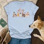 Light blue t-shirt with "dog" in script and a line of cartoon dogs on the chest.