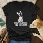 Black v-neck t-shirt with distressed graphic of a curious dog and text.