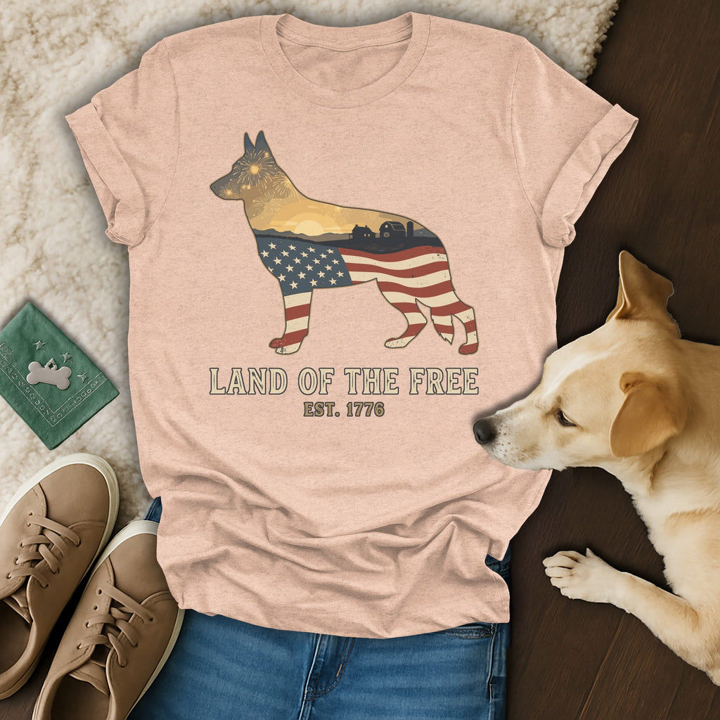 Dog silhouette filled with American flag pattern and scenic landscape.