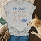 Light grey t-shirt with "I'M JUST" and cartoon dog faces, and "playing it by ear".