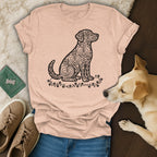Light pink t-shirt with a black heart-patterned dog graphic.