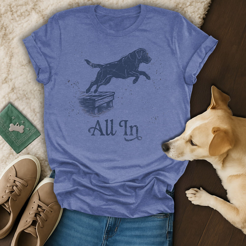 Blue t-shirt with a dog jumping over a wooden obstacle, text "All In".