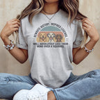 T-shirt with three dogs and text "WILL ABSOLUTELY LOSE THEIR MIND OVER A SQUIRREL".