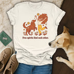 T-shirt with "Free spirits find each other" text, featuring woman and dog illustration.