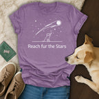 Purple t-shirt with "Reach fur the Stars" and a shooting star design.