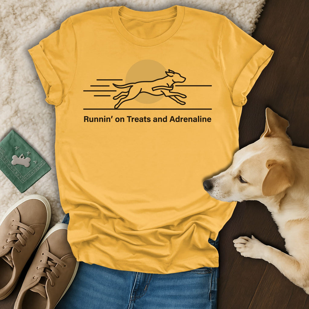 Yellow t-shirt with a black line drawing of a running dog and text "Runnin' on Treats and Adrenaline".