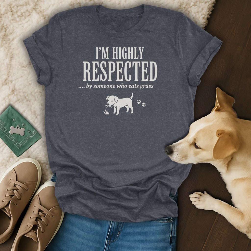 T-shirt with text "I'M HIGHLY RESPECTED ... by someone who eats grass" and dog graphic.