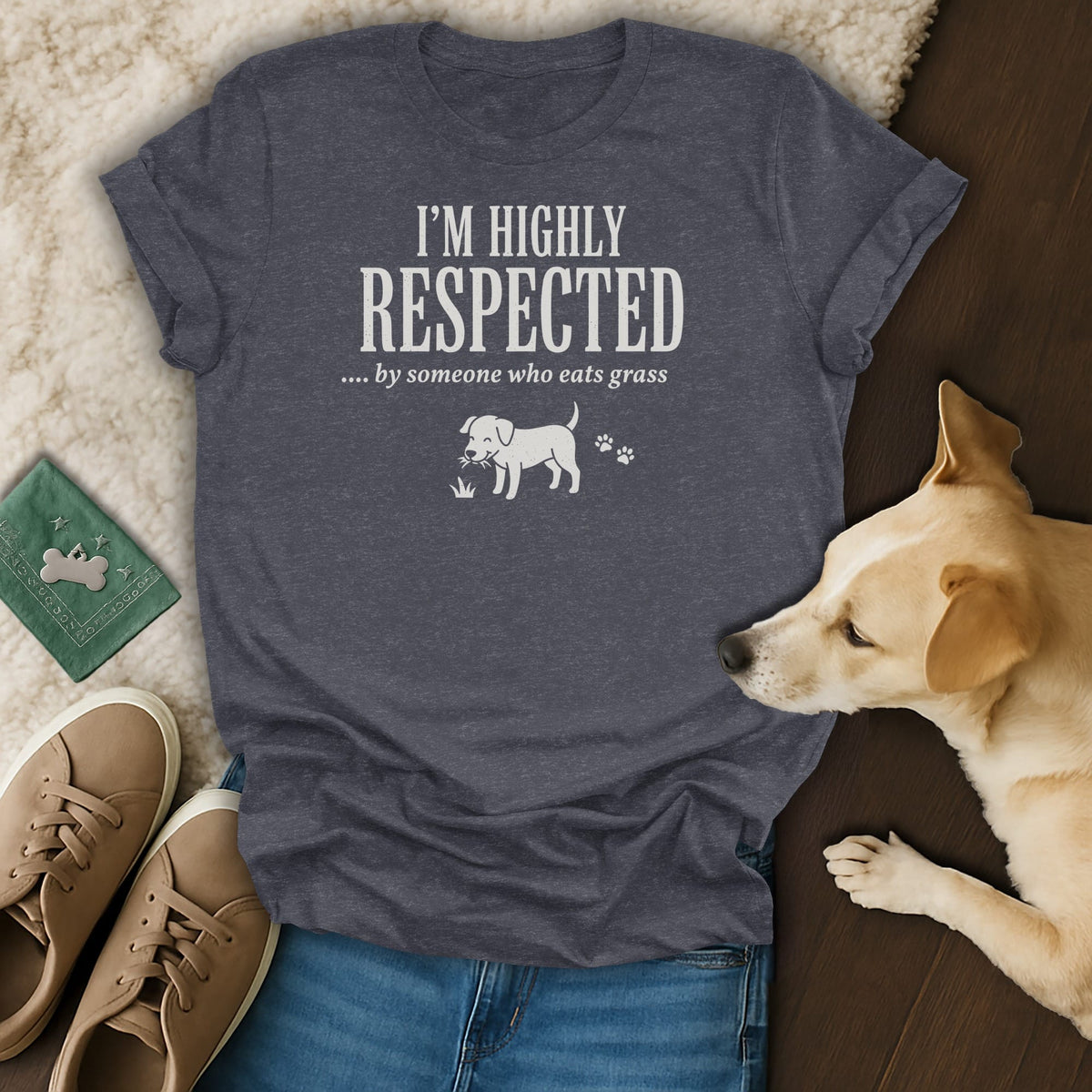 T-shirt with text "I'M HIGHLY RESPECTED ... by someone who eats grass" and dog graphic.