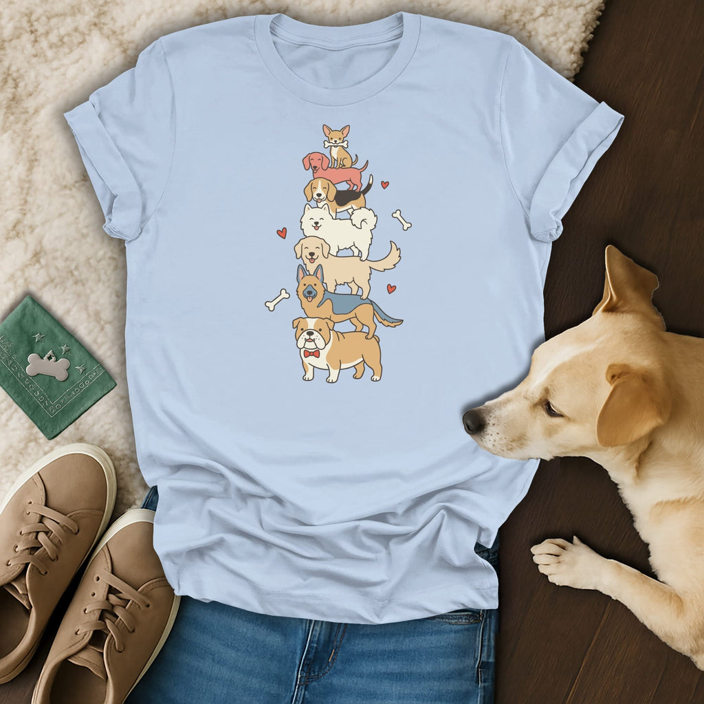 Light blue t-shirt with a stack of cartoon dogs and hearts graphic.