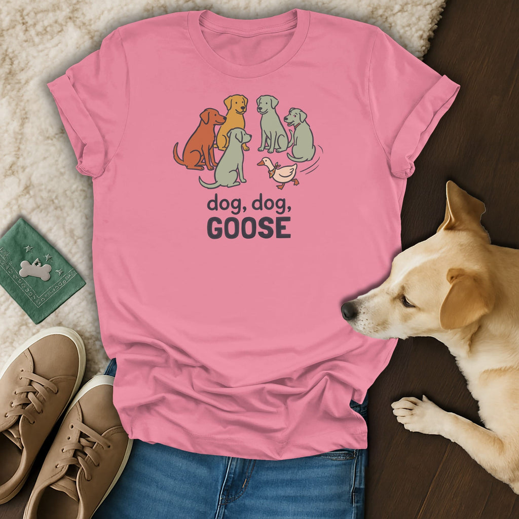 Pink t-shirt with cartoon dogs and a duck, text reads "dog, dog, GOOSE".