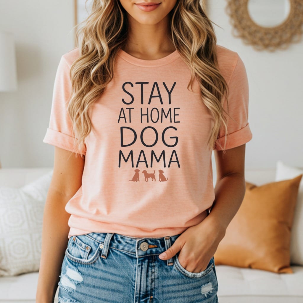 Peach t-shirt with "STAY AT HOME DOG MAMA" text and dog silhouettes.