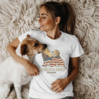 Woman wearing t-shirt with dog and American flag design.