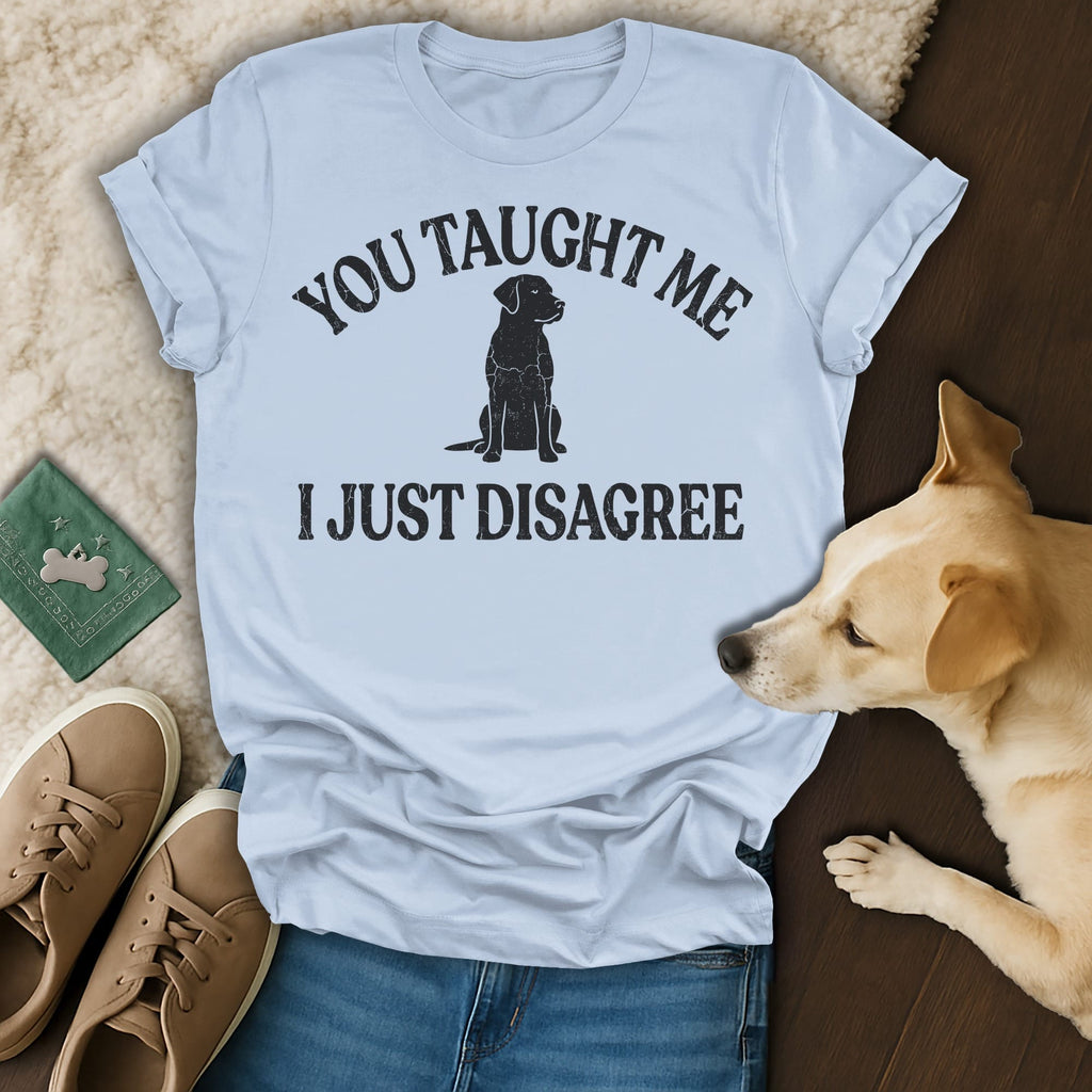 Light blue t-shirt with "You taught me I just disagree" and dog graphic.