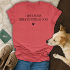 Red t-shirt with text "I HAVE PLANS (THEY'RE WITH MY DOG)" and paw print.