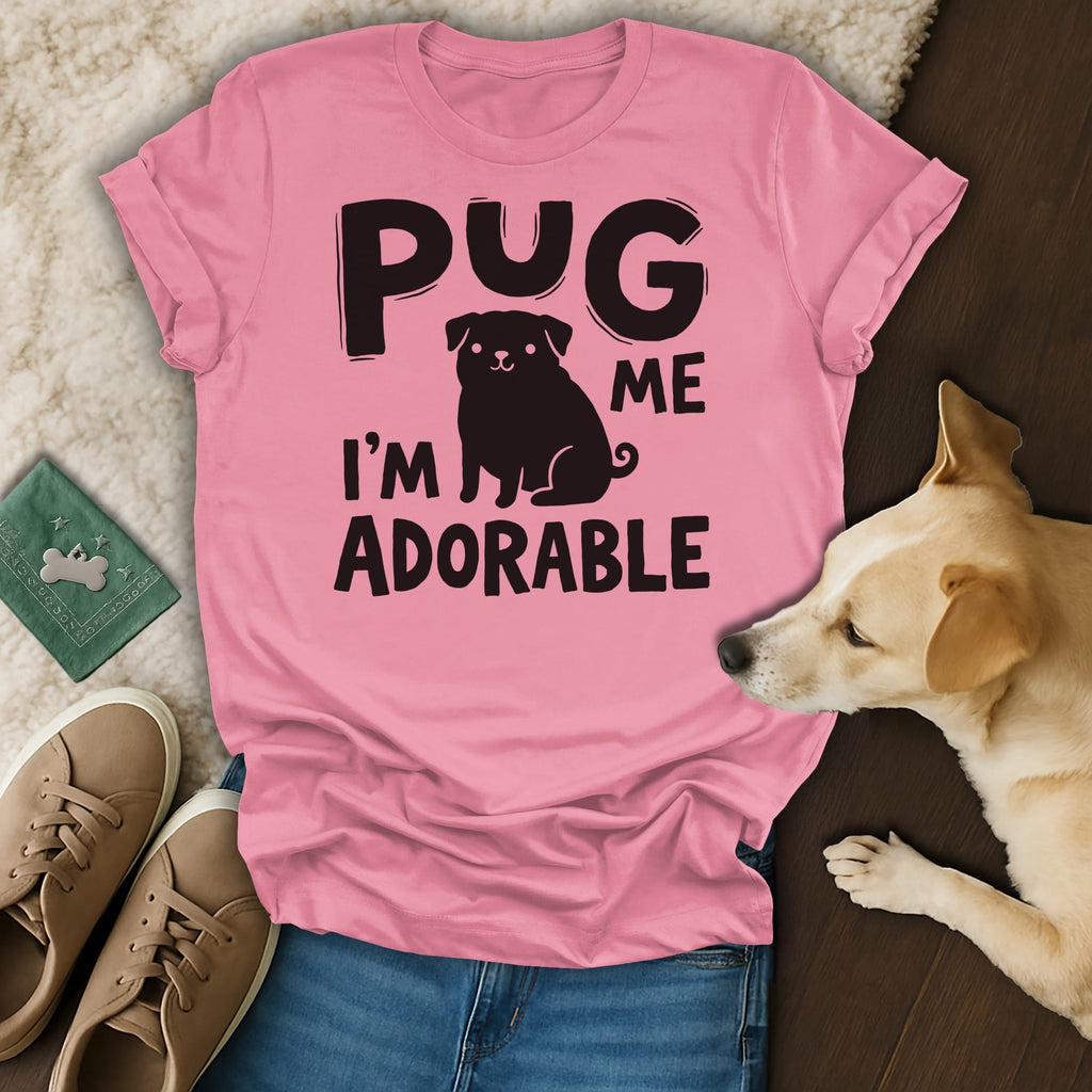 Pink t-shirt with "PUG ME I'M ADORABLE" text and pug graphic.