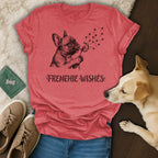 Frenchie Wishes graphic on heathered red t-shirt with French bulldog blowing dandelion seeds.