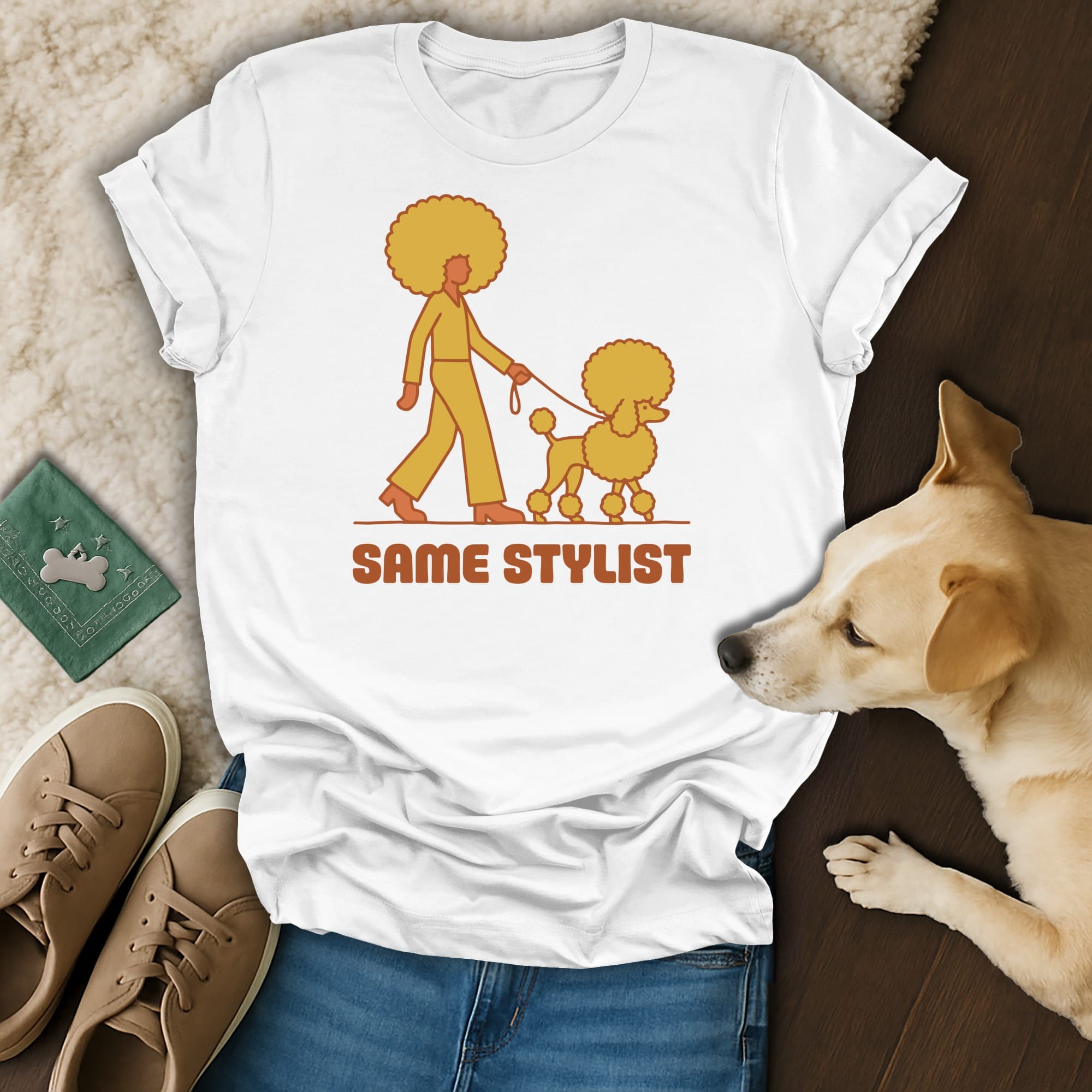 White t-shirt with a stylized person and poodle design, text reads "SAME STYLIST".
