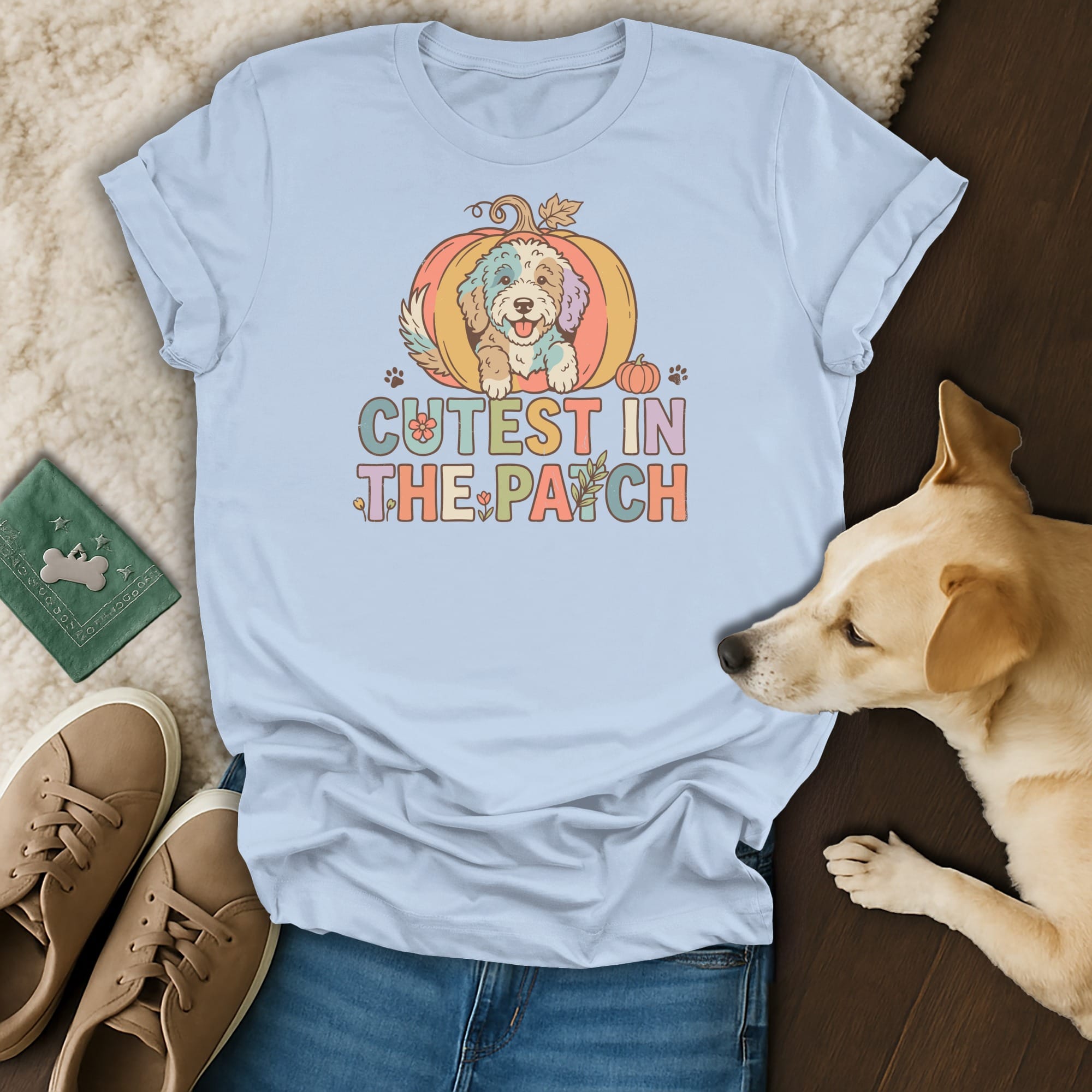 Light blue t-shirt with "Cutest in the Patch" text and dog in pumpkin graphic.