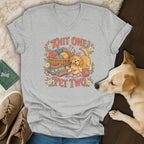 Heather gray v-neck t-shirt featuring a vintage graphic of a puppy, yarn basket, and Knit One Pet Two text.