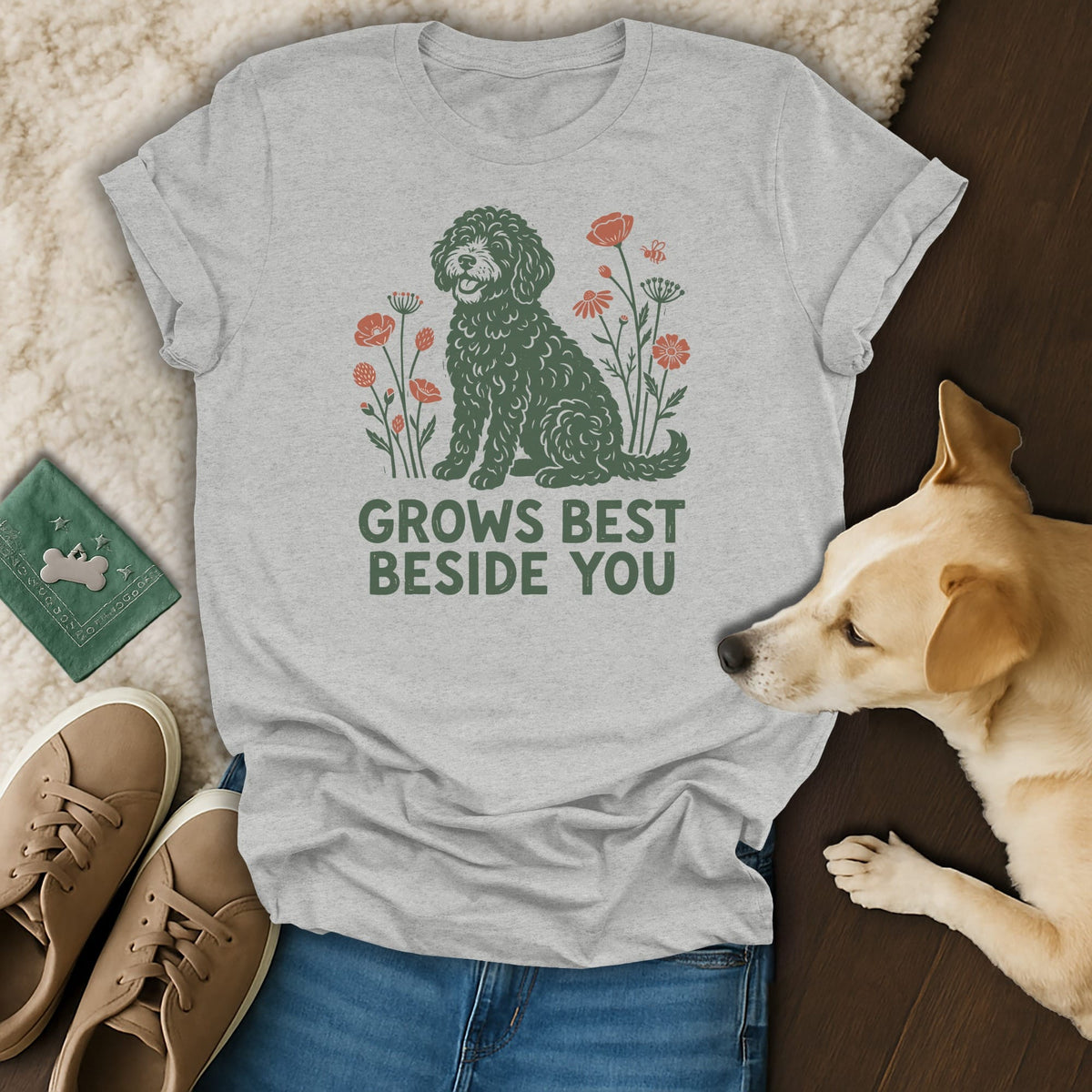 Heather gray t-shirt featuring a green doodle dog illustration and the text GROWS BEST BESIDE YOU.