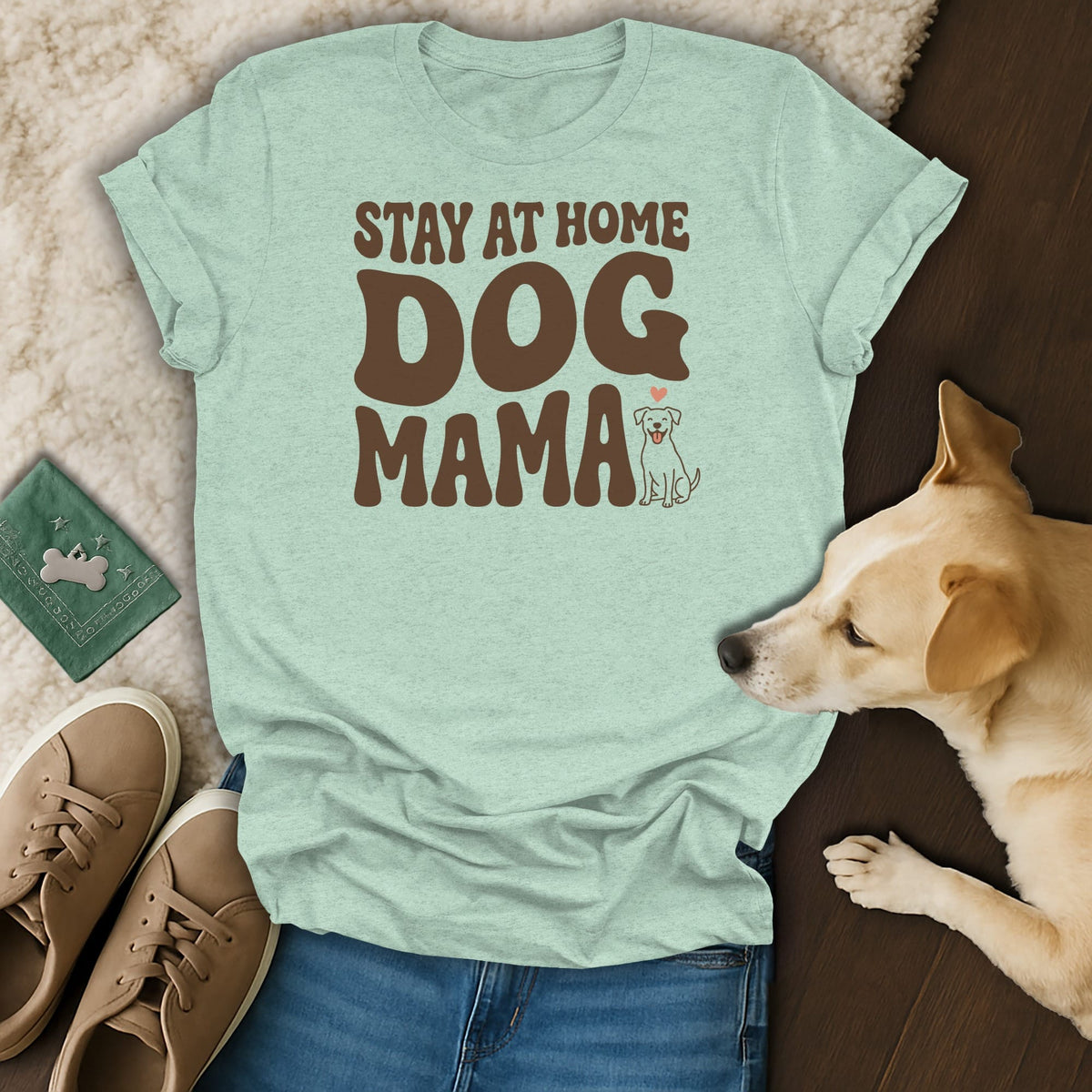 Light blue t-shirt with brown text "STAY AT HOME DOG MAMA" and a dog illustration.
