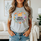 Grey t-shirt with a cartoon dog and flowers, text says "Spread Kindness And dog hair."