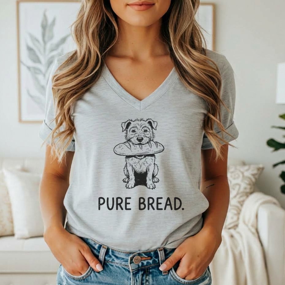 Line art dog with bread in mouth on light gray t-shirt with "PURE BREAD." text.