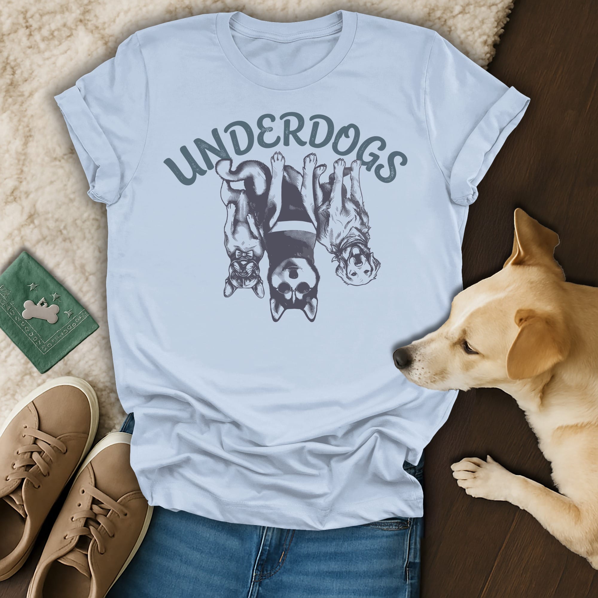 Light blue t-shirt with three dogs and "UNDERDOGS" text.