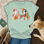 T-shirt with graphic of dogs playing pickleball with rackets and a ball.