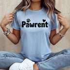 Light blue t-shirt with "Pawrent" text and paw print/heart graphic.