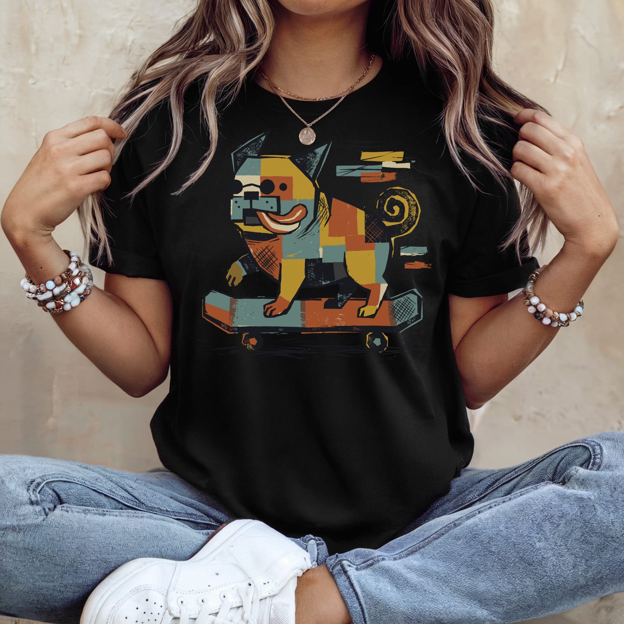Black t-shirt with colorful abstract dog on skateboard graphic.