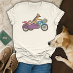 Cream t-shirt with graphic of dogs on a motorcycle with sidecar.