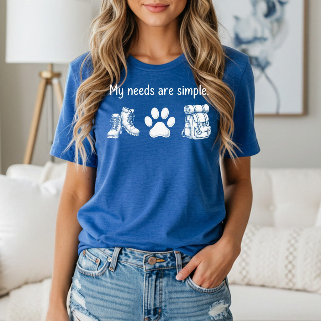 Blue t-shirt with "My needs are simple" text and hiking icons.