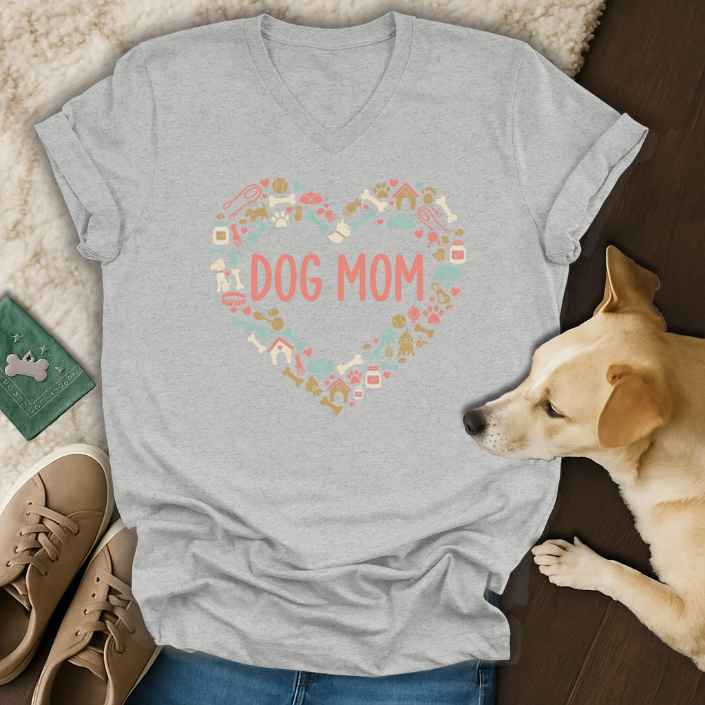 Gray v-neck t-shirt with "DOG MOM" in a heart of dog-themed icons.